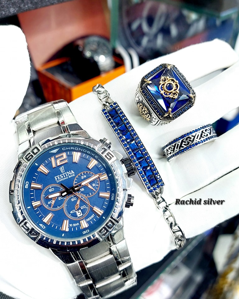 ساعة ميكانيكية مستوردة + مجموعة مجوهرات من الفضة الاسترلينية عيار 925